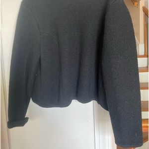 Black 100% wool with pearl buttons